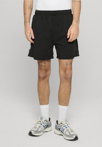 Shorts de bain Unfair Athletics en noir : devant