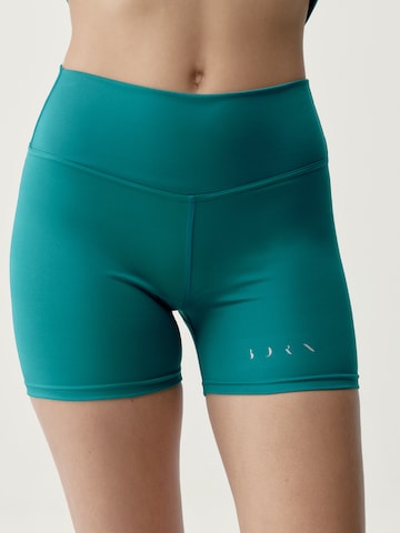 Skinny Pantalon de sport 'Roland' Born en vert