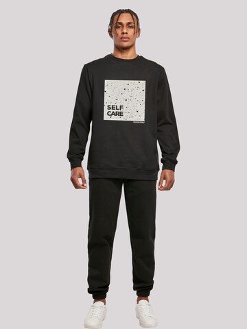 F4NT4STIC Sweatshirt 'SELF CARE' in Zwart