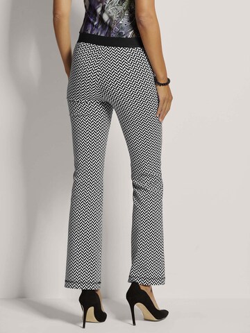 MADELEINE Flared Broek in Zwart