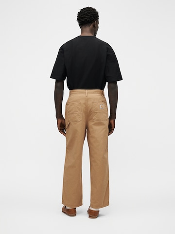 Carhartt WIP Baggy Laskoshousut 'Holden' värissä ruskea