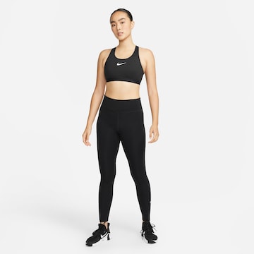 Bustino Reggiseno sportivo di NIKE in nero