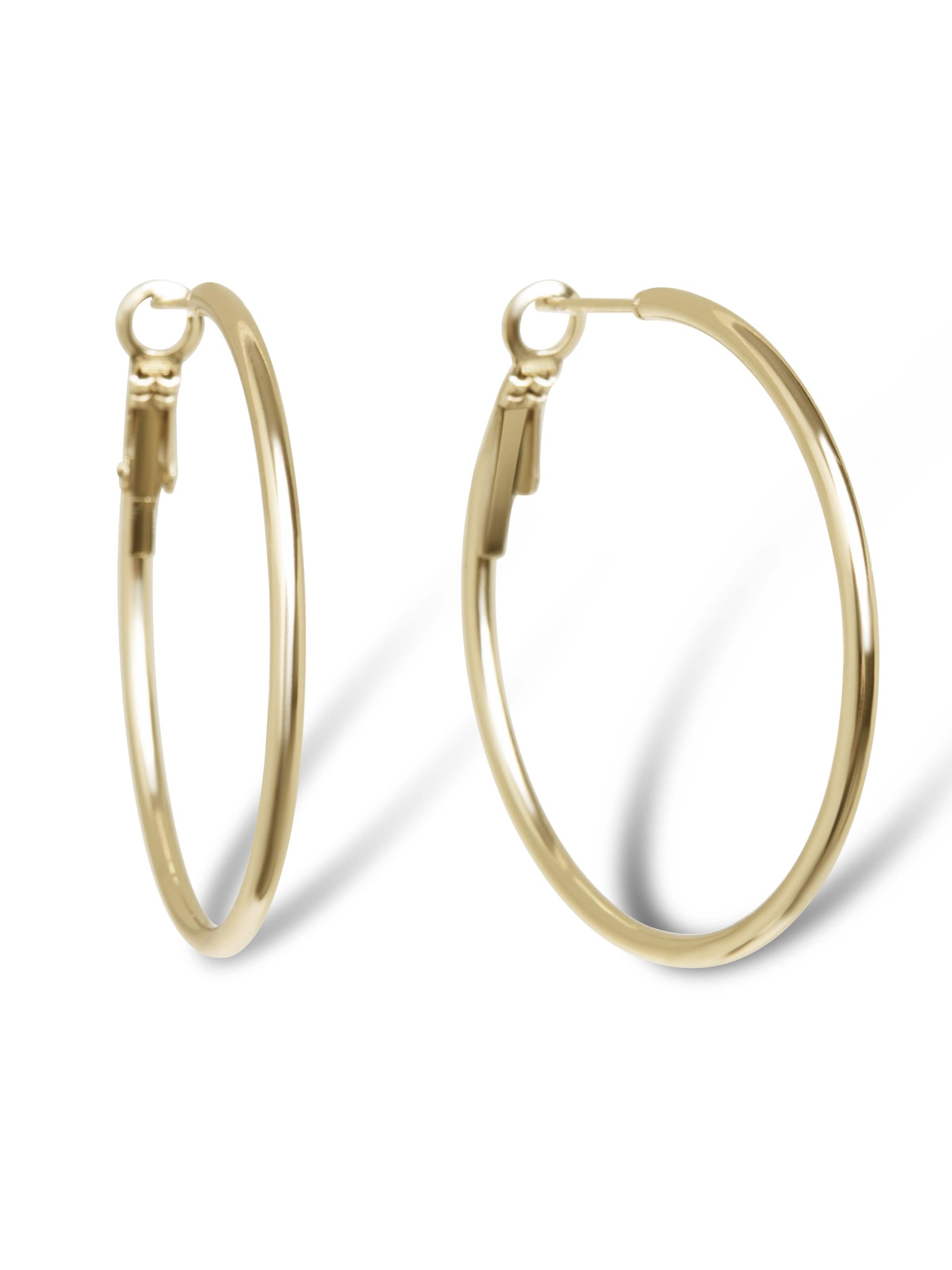 Boucles d'oreilles 'Tiny Hoops' Amberz en or : devant