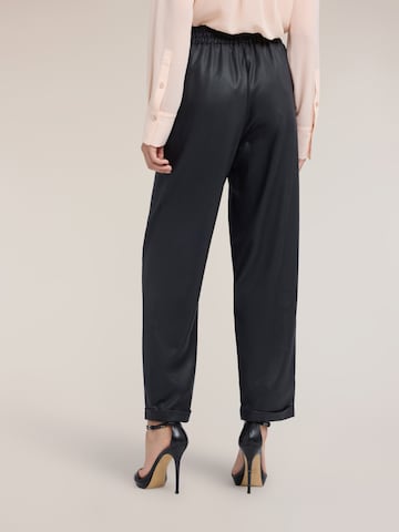 Regular Pantalon MOTIVI en noir