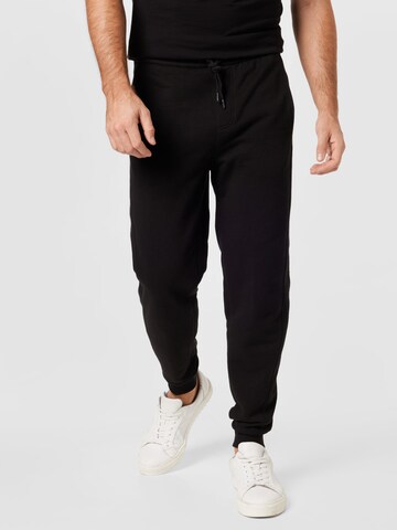 Calvin Klein JeansHlače - crna boja: prednji dio