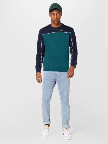 Champion Authentic Athletic Apparel Sweatshirt i blå