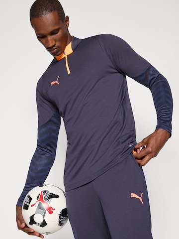 T-Shirt fonctionnel 'Individual CUP' PUMA en bleu