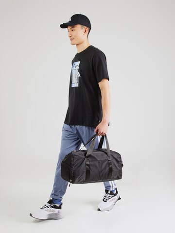 ADIDAS SPORTSWEAR Tapered Sports trousers in Blue