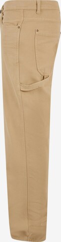 Karl Kani Loosefit Jeans i beige