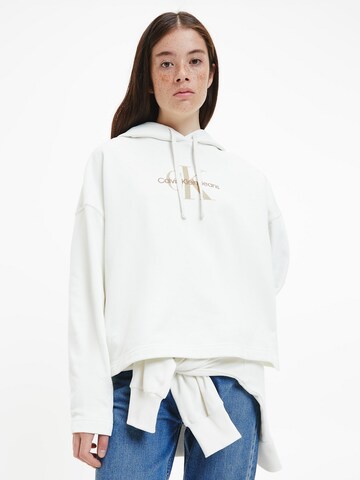 Sweat-shirt Calvin Klein Jeans en blanc : devant