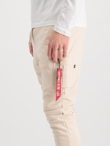 ALPHA INDUSTRIES Tapered Hose 'X-Fit' in Beige