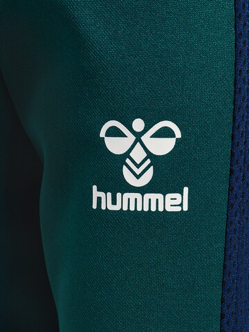 Hummel Regular Workout Pants in Green