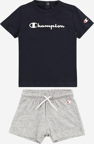 Champion Authentic Athletic Apparel Tracksuit in Blue: front