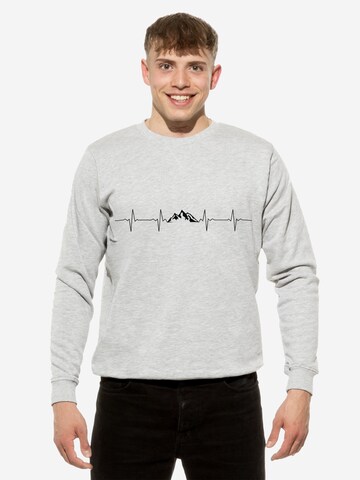 Cotton Prime Sweatshirt 'Pulsschlag Berge' in Grijs: voorkant