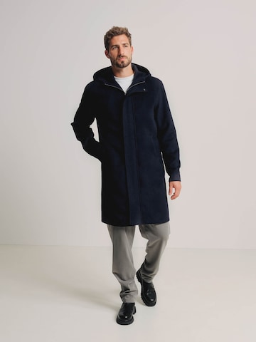 ABOUT YOU x Kevin Trapp Between-Seasons Coat 'Elia' in Blue