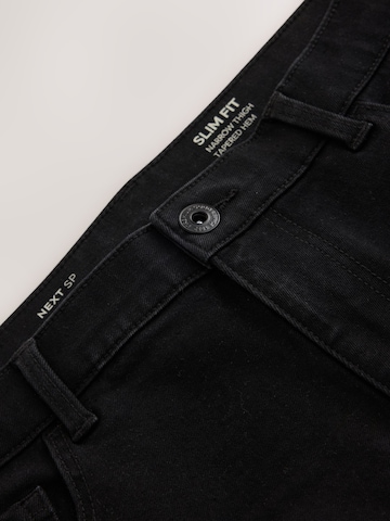 Next Slimfit Jeans 'Essential' in Zwart