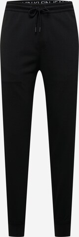 Calvin Klein Jeans Tapered Hose in Schwarz: predná strana