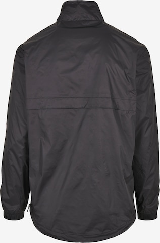 Coupe regular Veste mi-saison Urban Classics en noir