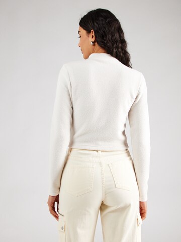 Nike Sportswear - Camiseta 'Phoenix' en beige