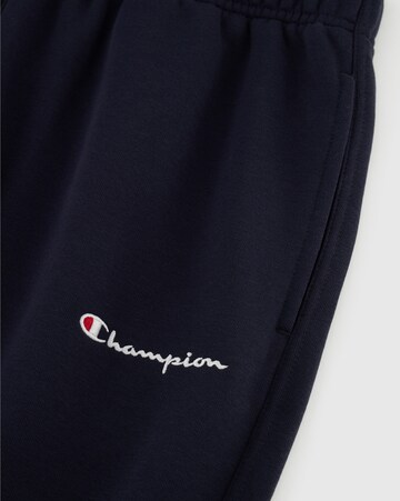 Champion Authentic Athletic Apparel Широка кройка Панталон в синьо