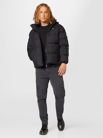 Veste d’hiver Tommy Jeans en noir