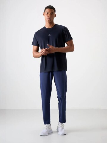 T-Shirt fonctionnel Tommy Life en bleu