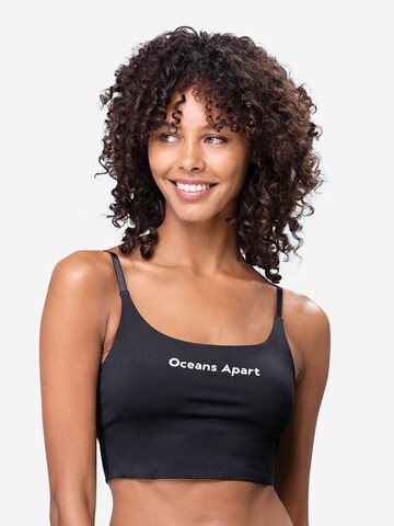 OCEANSAPART Sports Top 'Beauty' in Black: front