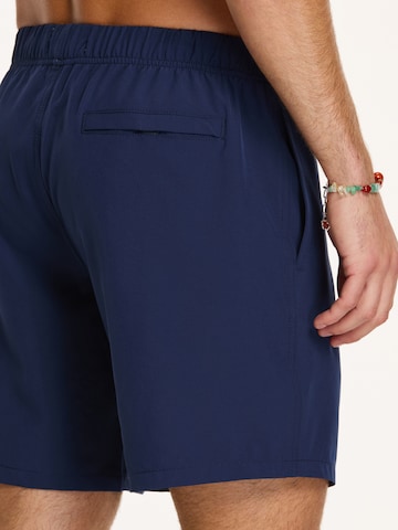 Shiwi Kratke kopalne hlače 'MIKE' | modra barva