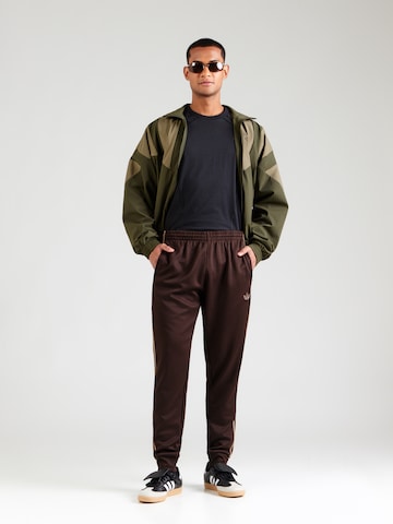 Tapered Pantaloni 'SST' de la ADIDAS ORIGINALS pe maro