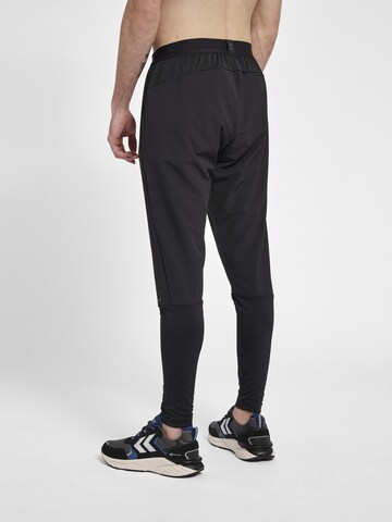 Hummel Tapered Sports trousers in Black