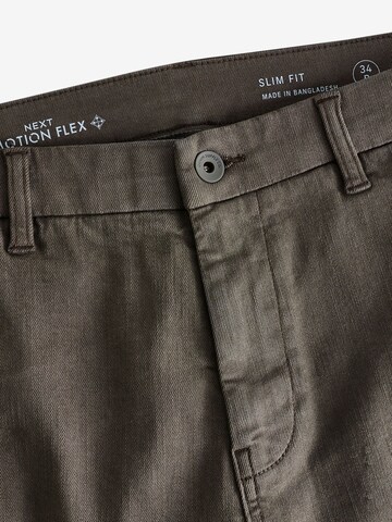 Slimfit Pantaloni chino di Next in verde