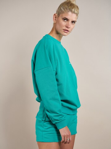 ABOUT YOU x Laura Giurcanu Sweatshirt 'Luca' in Green