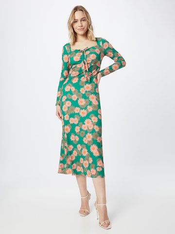 Rochie de la Warehouse pe verde: față