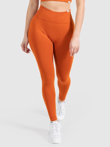 Smilodox Skinny Sportbroek 'Amaze Pro' in Oranje: voorkant