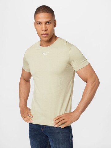 T-Shirt Calvin Klein Jeans en beige : devant