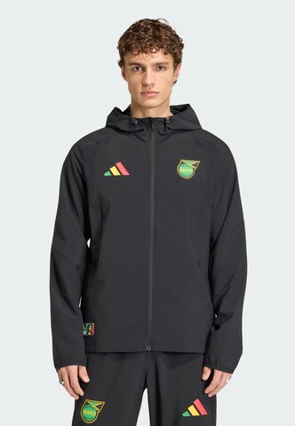 ADIDAS PERFORMANCE Sports jacket 'Jamaika x Bob Marley Tiro Travel' in Black: front