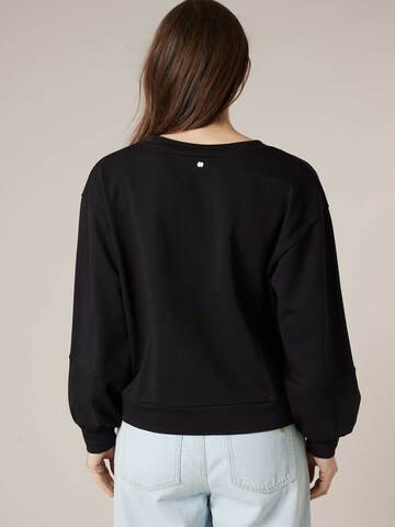 Sweat-shirt 'Cherryna' Deeluxe en noir