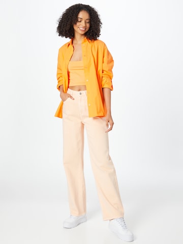 Pimkie Široke hlačnice Kavbojke | oranžna barva