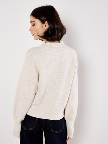 Pull-over ' ' Apricot en gris