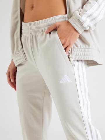 Tapered Pantaloni sportivi di ADIDAS SPORTSWEAR in bianco