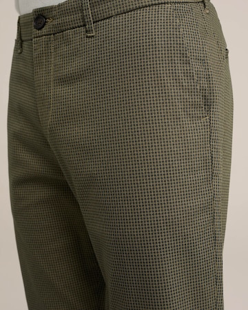 WE Fashion - Slimfit Calças chino em verde