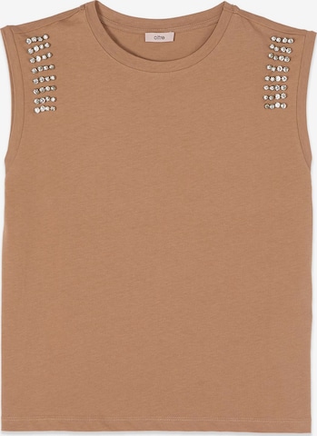 Top di oltre in beige: frontale
