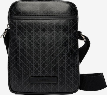 Calvin Klein Crossbody bag 'EMBLEM AOP COATED SLIM REPORTER LV04D3334G' in Black: front