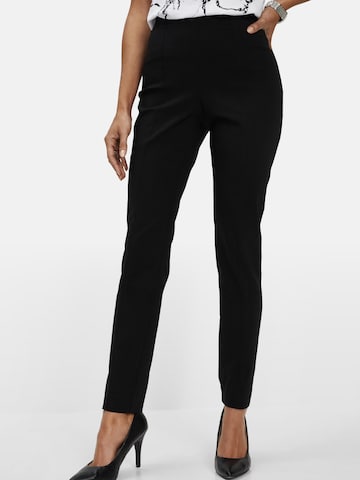 bonprix Skinny Nadrág - fekete: elől
