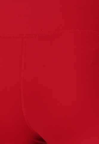 Athlecia Slim fit Sports trousers 'Blossom' in Red