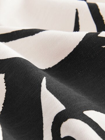 T-Shirt Next en blanc