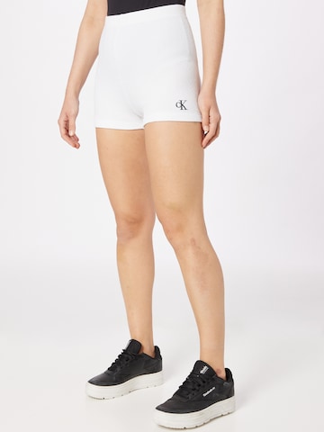 Calvin Klein Jeans Skinny Legíny – bílá: přední strana