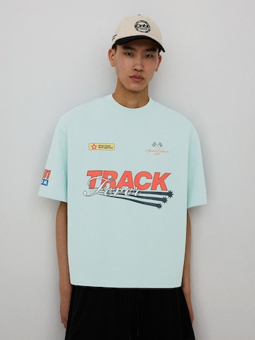 Bershka T-Shirt 'SAVAG' in Blau