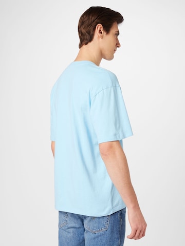 EDWIN Bluser & t-shirts 'Sunset On' i blå