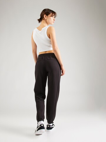 Regular Pantalon de sport 'MOTION' PUMA en marron